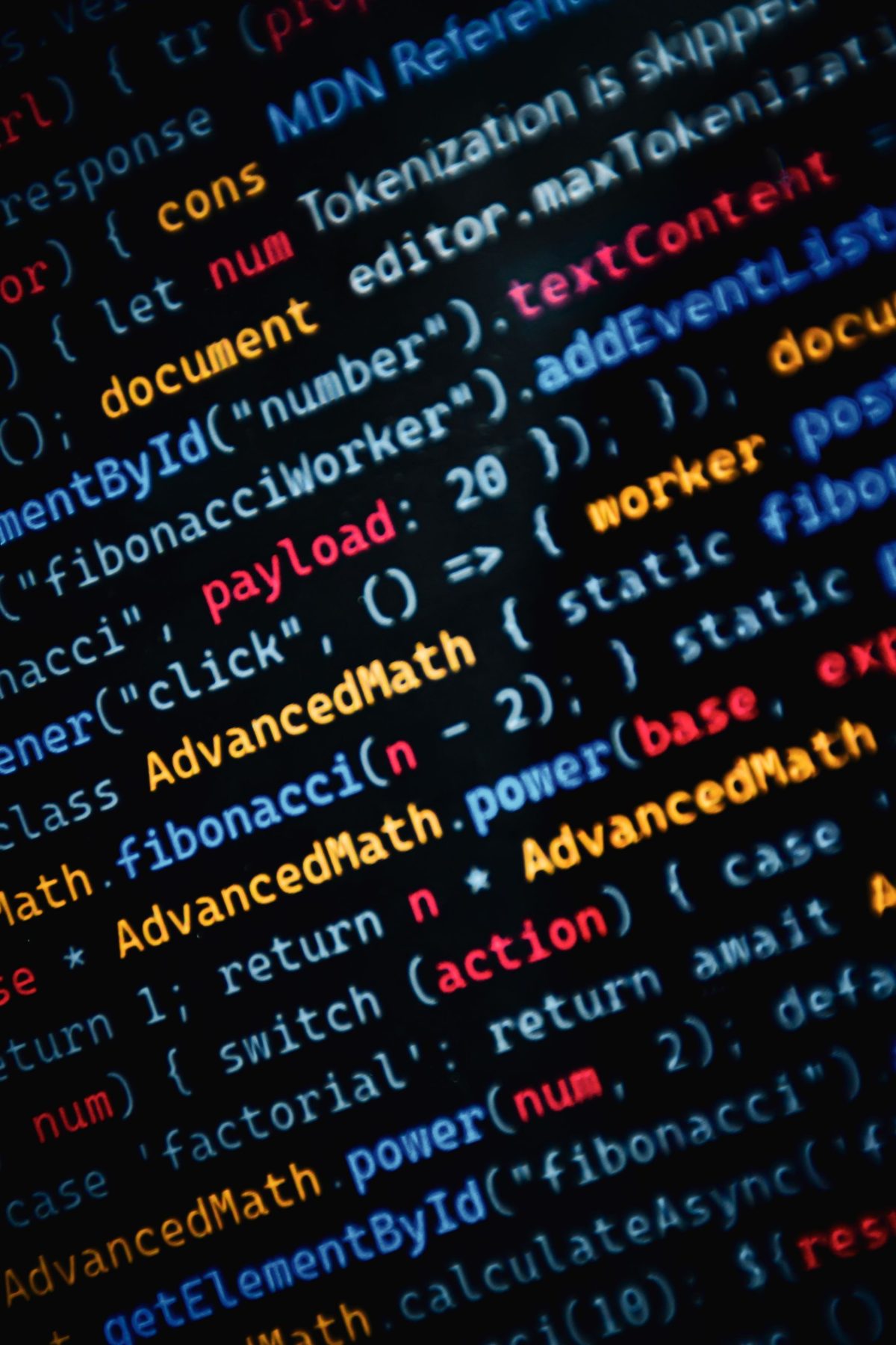 Lines of code glowing on a dark screen